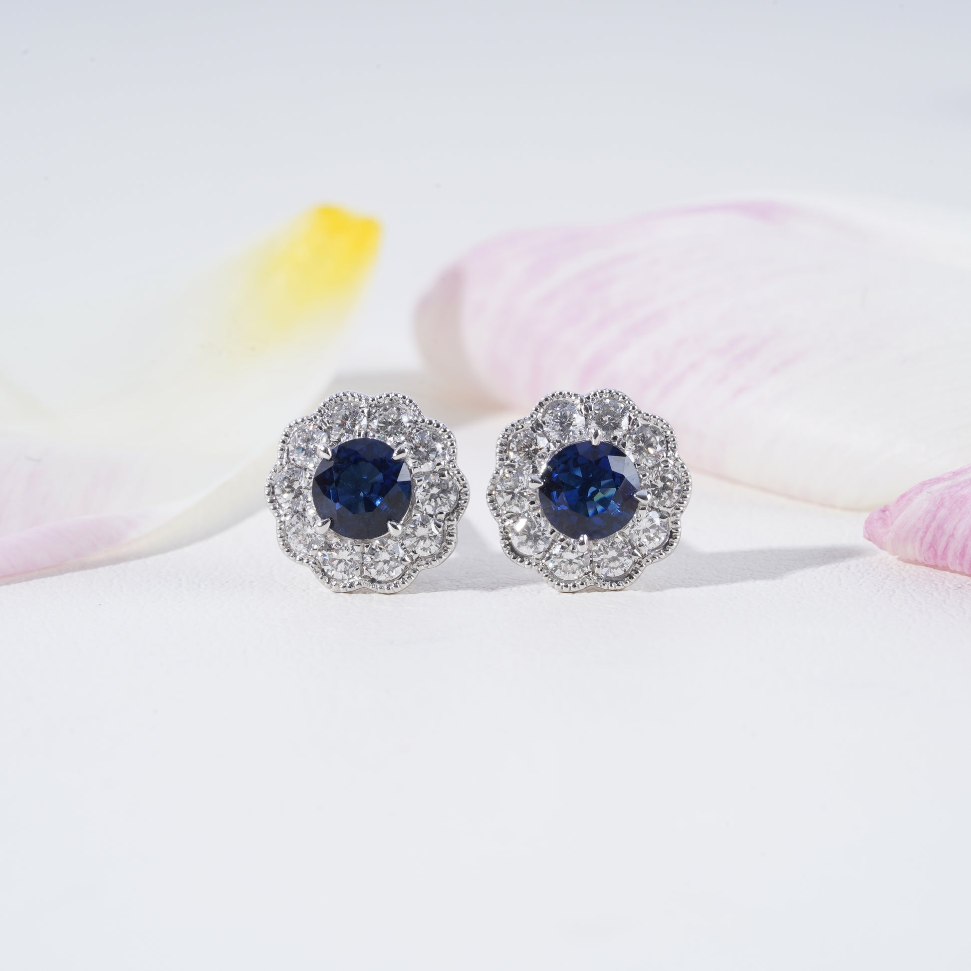 Blue Sapphire & Diamond Halo Earrings in 18K White Gold