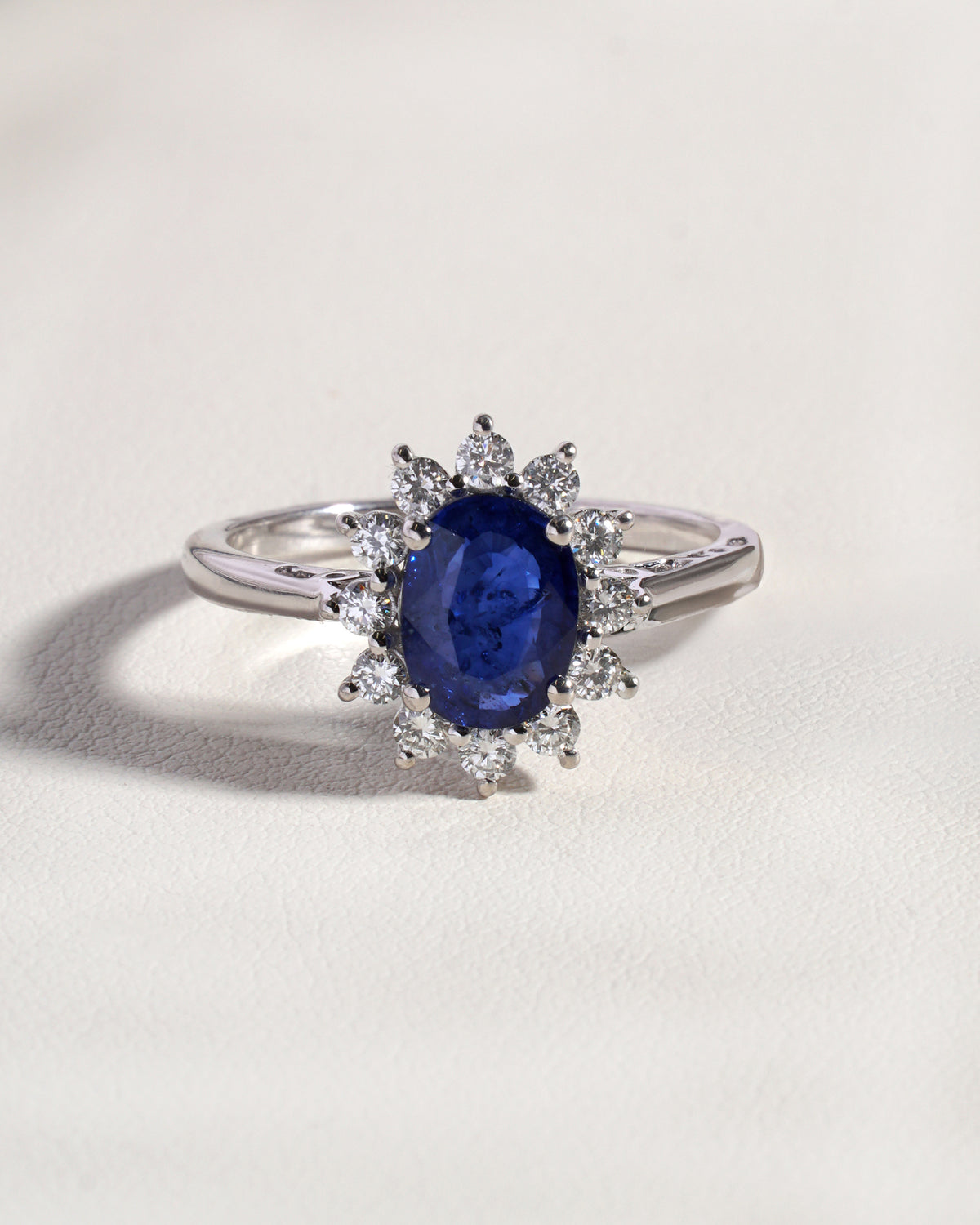 Eira Blue  Natural  Sapphire &  Natural  Diamond Halo Ring in 18K White Gold