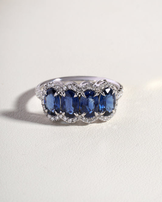Naya Blue Natural Sapphire & Natural Diamond 5 Stone Eternity Band with Halo in 18K White Gold